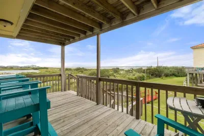 Second level deck includes elevated chairs to take in the amazing views of the beautiful sunrises.