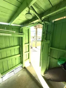 Patio includes a 2nd outdoor shower that includes hot and cold water.