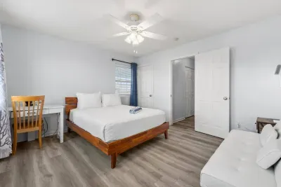 Queen sized bed with dedicated workspace and sofa bed for extra sleeping space.  Bedroom also has access to deck on the 3rd level giving way to those amazing ocean views and beautiful sunrises.