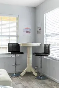 Two seat high top table in the spacious living room with amazing ocean views and Roku TV for your streaming.  