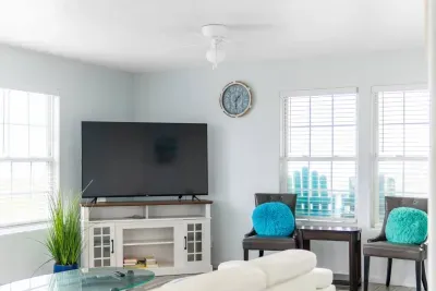 Spacious living room with amazing ocean views and Roku TV for your streaming.  