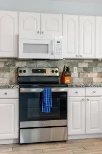 Fully stocked kitchen with all the appliances and utensils that you need to prepare any meal needed.  Electric cooktop and oven.