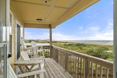 Third level deck includes elevated chairs to take in the amazing views of the beautiful sunrises.