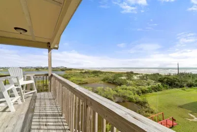 Third level deck includes elevated chairs to take in the amazing views of the beautiful sunrises.