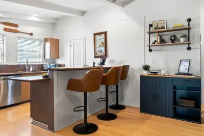 Pull up a seat at the island, perfect for morning coffee, casual meals, or keeping the cook company. 