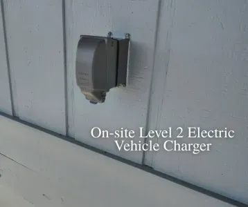 An on-site Level 2 electric vehicle charger, providing fast and convenient power for your car during your stay.
