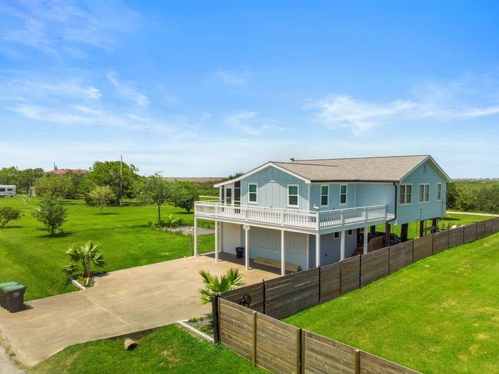 Right off the street, a spacious parkway provides convenient parking just steps from the front door, making arrivals and departures effortless for guests.