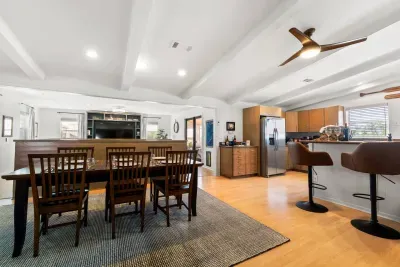 Share meals, laughter, and moments at the dining table, with the warmth of the kitchen nearby and the comfort of the living room just steps away. 