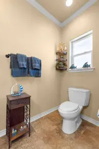 Bright, clean bathroom with fresh towels, coastal decor, and plenty of space—perfect for getting ready comfortably during your stay.