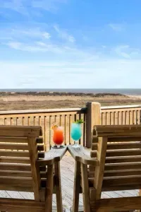 Sip your favorite drink on the deck and enjoy the coastal views and ocean breeze—perfect for sunrise coffee or sunset cocktails.