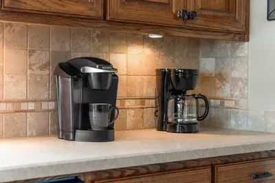 Coffee lovers will feel right at home—enjoy a dedicated coffee station with both a Keurig and drip coffee maker, ready to fuel your mornings before heading out for the day.