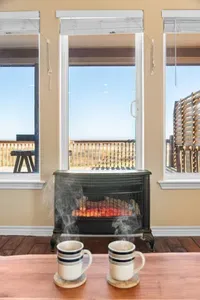 Cozy up and enjoy the view with a warm fire and ocean breezes just outside.