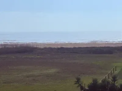 Peaceful Gulf views right from the deck—watch the waves roll in and enjoy the open dunes and coastal breeze just steps from the beach.