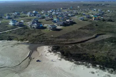 Aerial views show just how close you are to the shoreline, with peaceful dunes, open space, and a laid-back beach community all around.