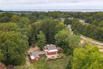 Bear’s Lakeshore Lodge is situated on a perfectly wooded 2.5 acres, allowing for privacy and space to enjoy gatherings. If you are looking for a place to relax, gather, reconnect, or explore the area, Bear’s Lakeshore Lodge is for you. 