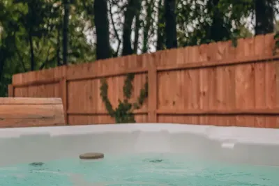 Relax & unwind! You will find the secluded hot tub right off of the living room for extremely convenient access. The hot tub is available for use year-round. Enjoy!