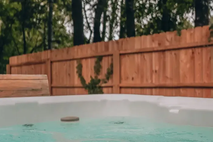 Relax & unwind! You will find the secluded hot tub right off of the living room for extremely convenient access. The hot tub is available for use year-round. Enjoy!