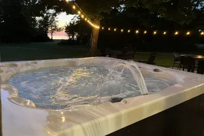 Enhance your evening by witnessing a breathtaking sunset over Lake Michigan while relaxing in the hot tub! It's an unforgettable experience that you will not want to miss! 