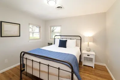 Turn in for the night! The secondary bedroom has a cozy queen bed and is located off of the living room. All bedrooms offer a closet, built in drawers, sound machine, and extra blankets. 