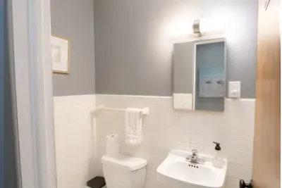 The half bath offers added convenience for larger groups, featuring a toilet and sink for your comfort.