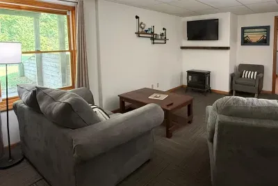 Get comfy in this welcoming space! The lower level living room is a great spot to spread out, relax on the couch, watch a movie, get some work done at the desk, or enjoy one another’s company! 