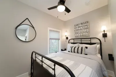 Sweet dreams! The main floor bedroom offers a comfortable full bed, bedside shelves, and a closet for hanging your clothes. 