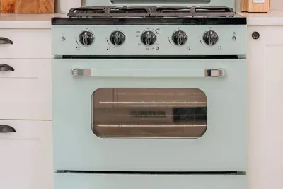 The Classic Retro style appliances really tie in the vintage charm throughout the house! Enjoy preparing meals in this spacious and charming kitchen.  