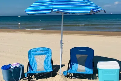 Beach days made EASY! A stay at Maddie's Haven comes with a beach umbrella, beach towels, a beach blanket, a beach bag, cooler, and 2 beach chairs.