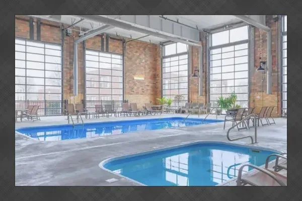 Rain or shine, enjoy the community pool & hot tub at Central Lofts. During the cooler months, enjoy the enclosed heated pool and hot tub area.