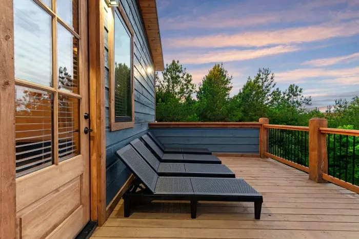 [Private balcony] look at this sunset on the private master balcony. Imagine laying in our sun chairs with your friends and some wine!
