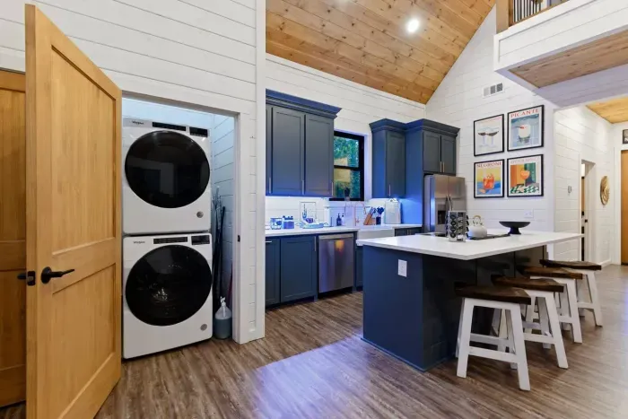 [laundry] Laundry room attached to the kitchen and brand new artwork in the kitchen! Which drink is your favorite?!