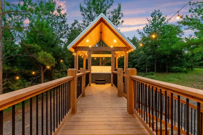[Hot Tub] The walkway from our main house to the hot tub. Absolutely beautiful view with the sunset in the background! Can't wait for you to enjoy this space