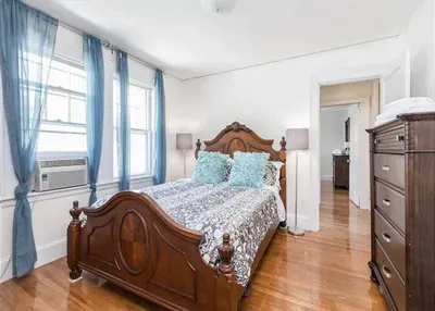 A guest room with beautiful lighting.