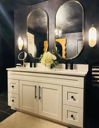 Step into your private sanctuary. The moody master bath sets the tone with rich tones, luxe finishes, and a spa-like vibe.