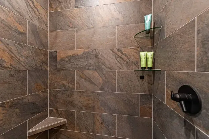 Tile walk in shower.