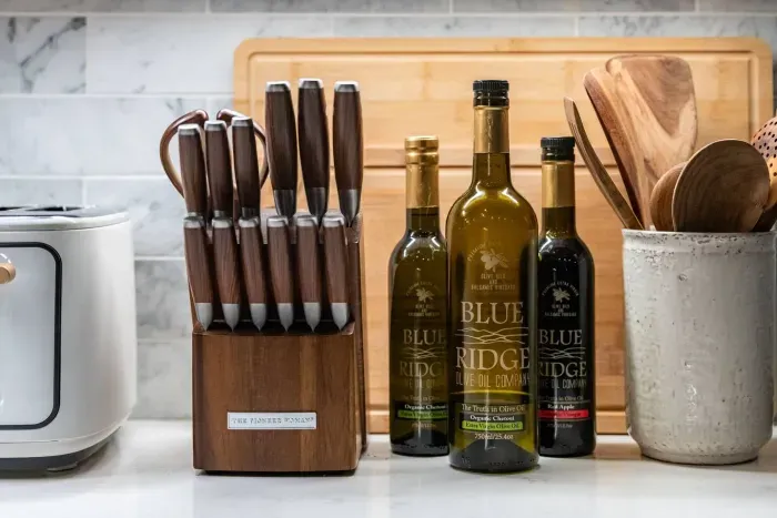 Utensils, oils, spices, knives, and toaster -- everything you need.