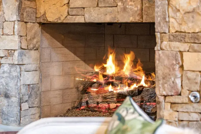 Warm up and get cozy by the gas fireplace inside.