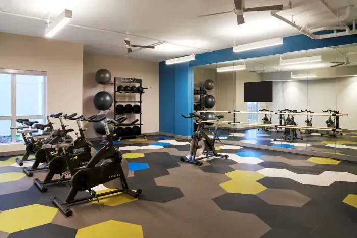 The Fitness Center is ready for you to get those reps in during your stay.