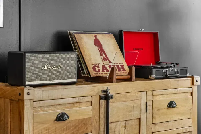 Our rental is outfitted with a Crosley record player, an assortment of vinyls, and a Marshall bluetooth speaker.