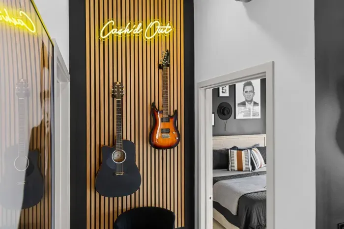 Get ready to get Cash'd Out!  Our feature guitar wall is definitely a focal point in the living room.  Put on a vinyl and enjoy some of Cash's tunes.