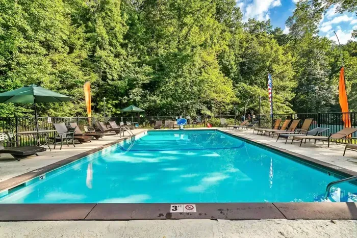 Plenty of deck space and poolside tables under the trees. Pack a cooler and make an afternoon of it.