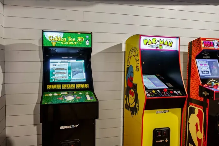 Golden Tee 3D, Pac-Man, and NBA Jam lined up and ready. No quarters required.
