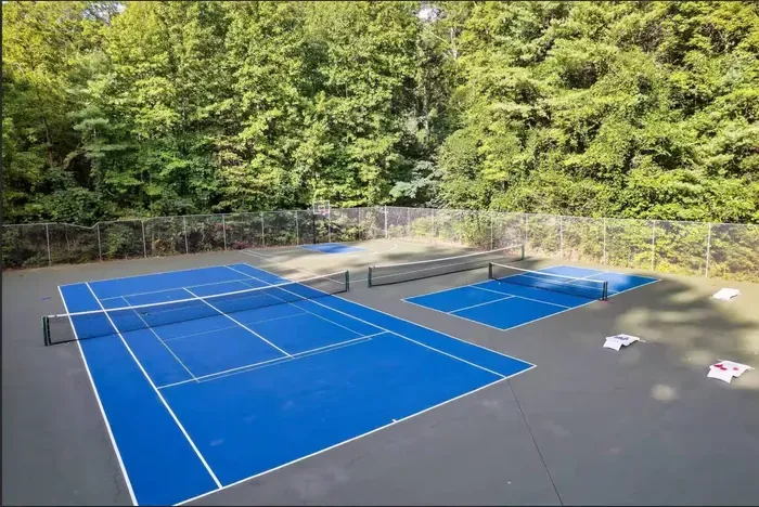 Resort courts for tennis, pickleball, and basketball, all fenced and freshly surfaced. Bring rackets or grab a game.