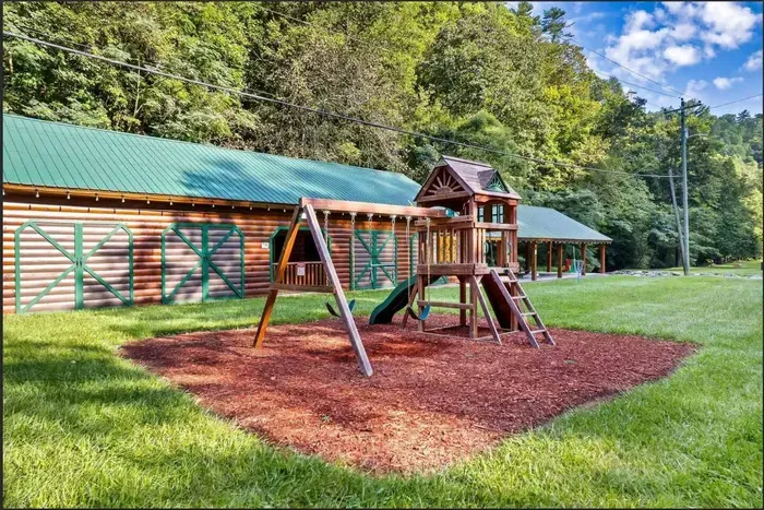 Playground with swings, a slide, and a climbing fort right by the pavilion. The kids will find it before you unpack.