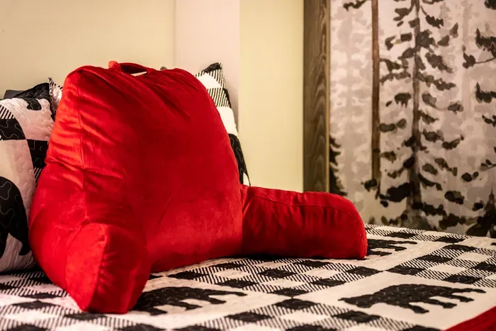 Reading pillow, bear quilt, forest curtains. Built for the morning you don't get out of bed.