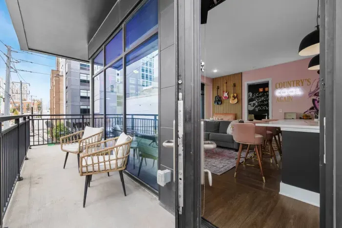 Step outside and enjoy the large, private balcony.