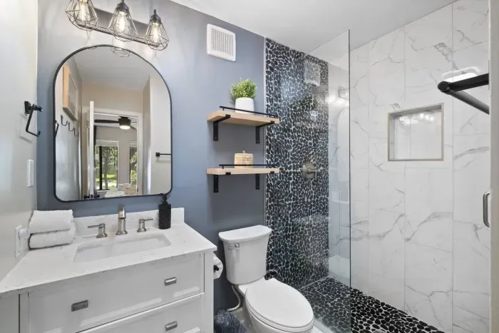 Bathroom in Primary Bedroom with Deluxe Shower Head.