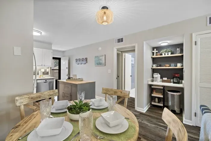 Curated neutral color palette dominates the kitchen and dining