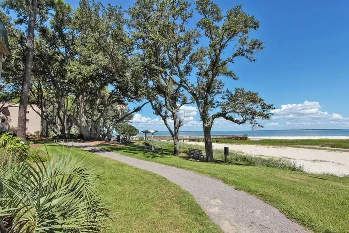 Great walkways for exploration of the beautiful water front area, oaks, lagoon, two outdoor Pools