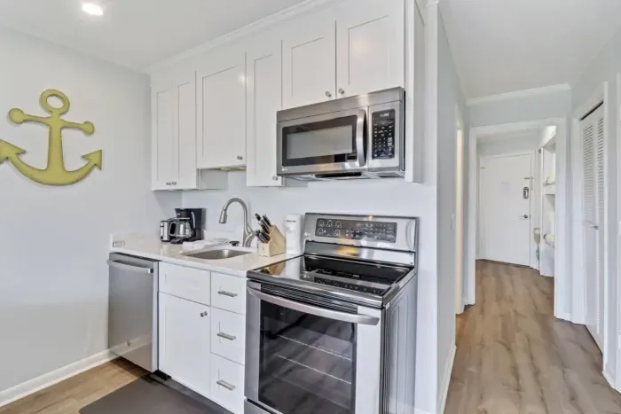 Full Kitchen with a coffee maker.